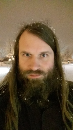 A photo of Martin: a bearded guy
with snow in his hair